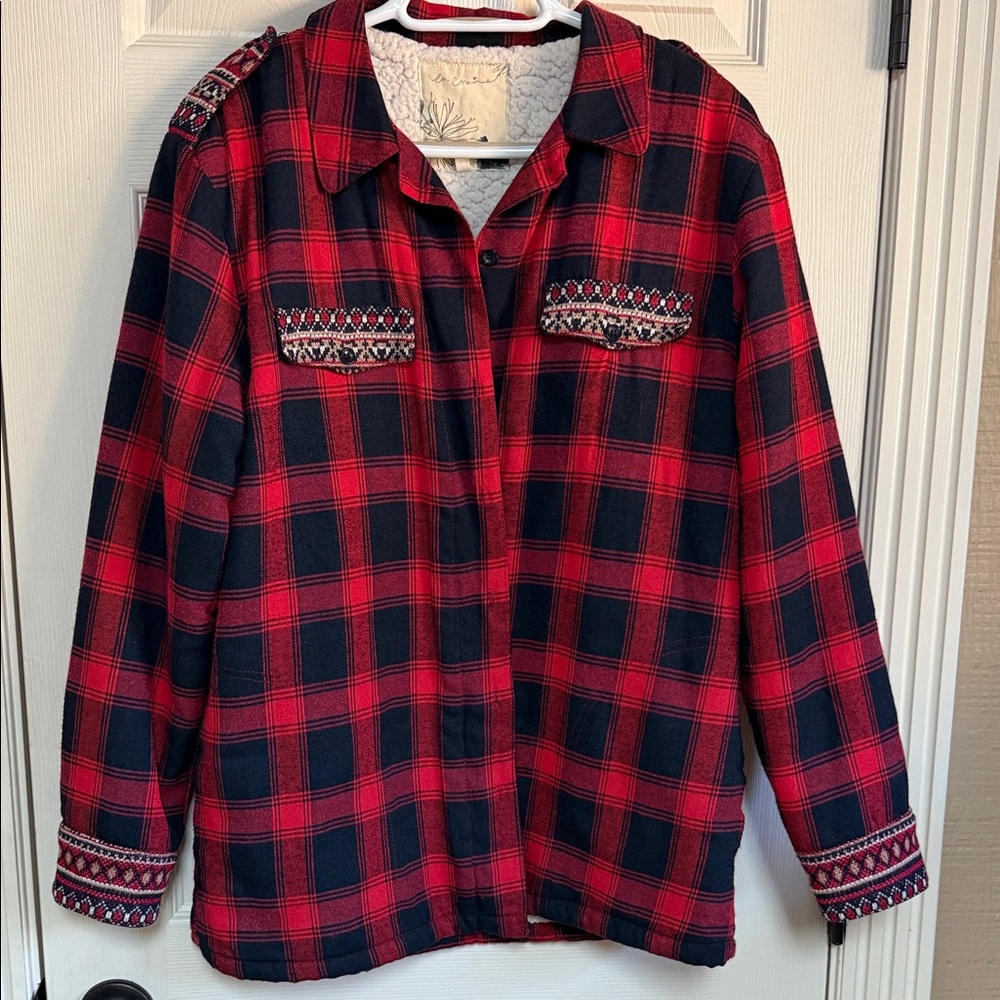 En Creme Black and Red Sherpa jacket.